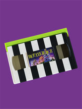 The Beetlejuice VHS Clutch